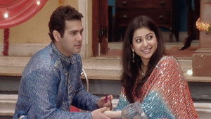 Birju Applies Mehendi to Baby