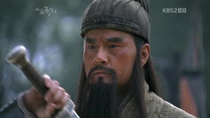 Liu Bei receives an imperial decree and swears to destroy Cao Cao