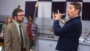 Ellie Kemper Wears a Purple Ruffled Sleeveless Top & Lavender Flats